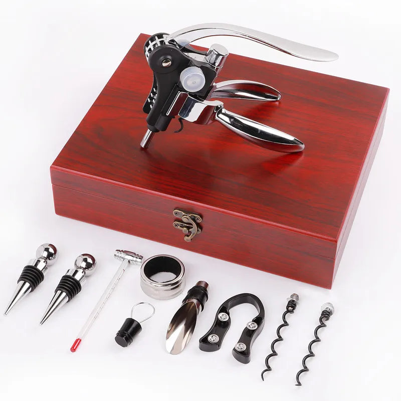 Wine tool set with corkscrew, bottle stoppers, and other accessories on a white background