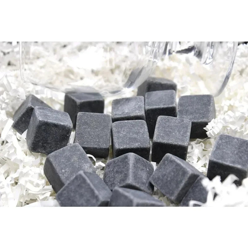 Dark gray cube-shaped stones on a white background