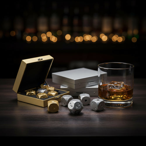 Gold and silver dice with a metallic box on a white background