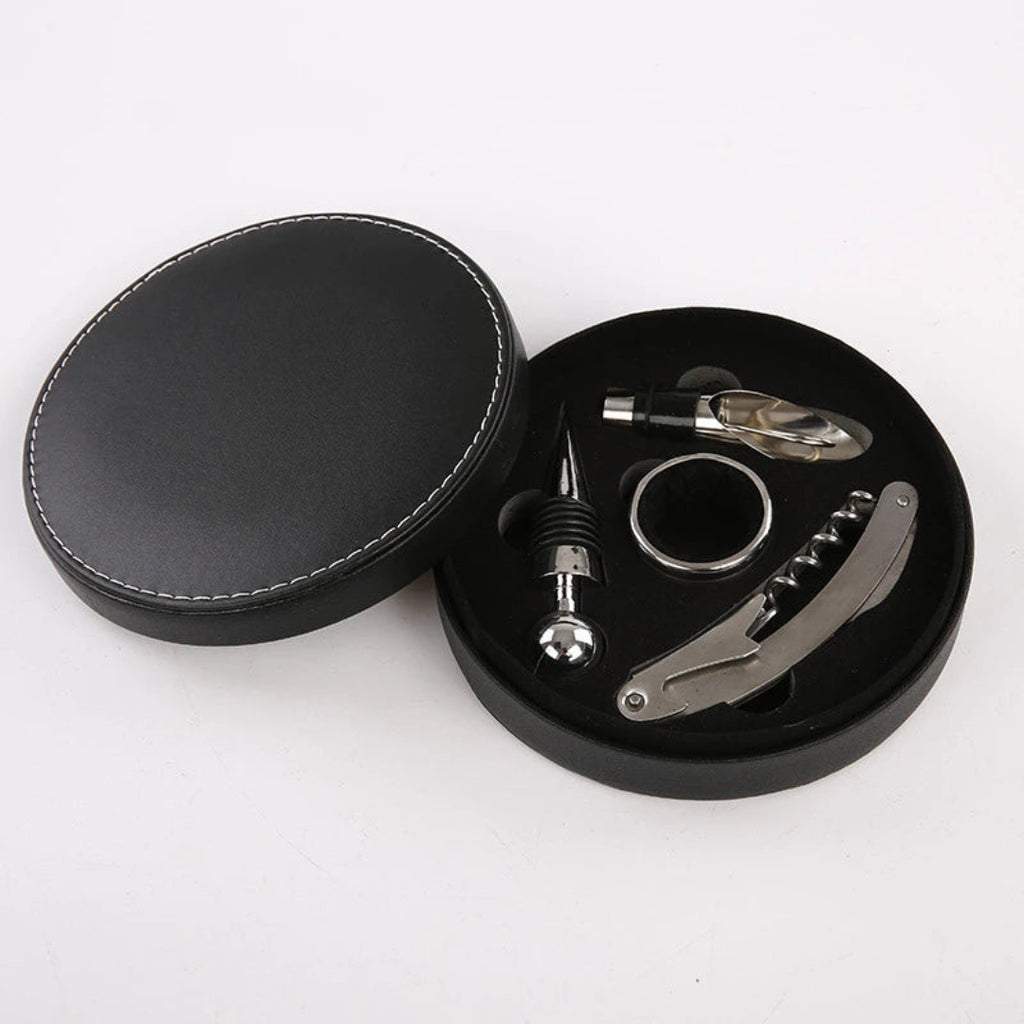 Wine tool set in a black round case on a white background