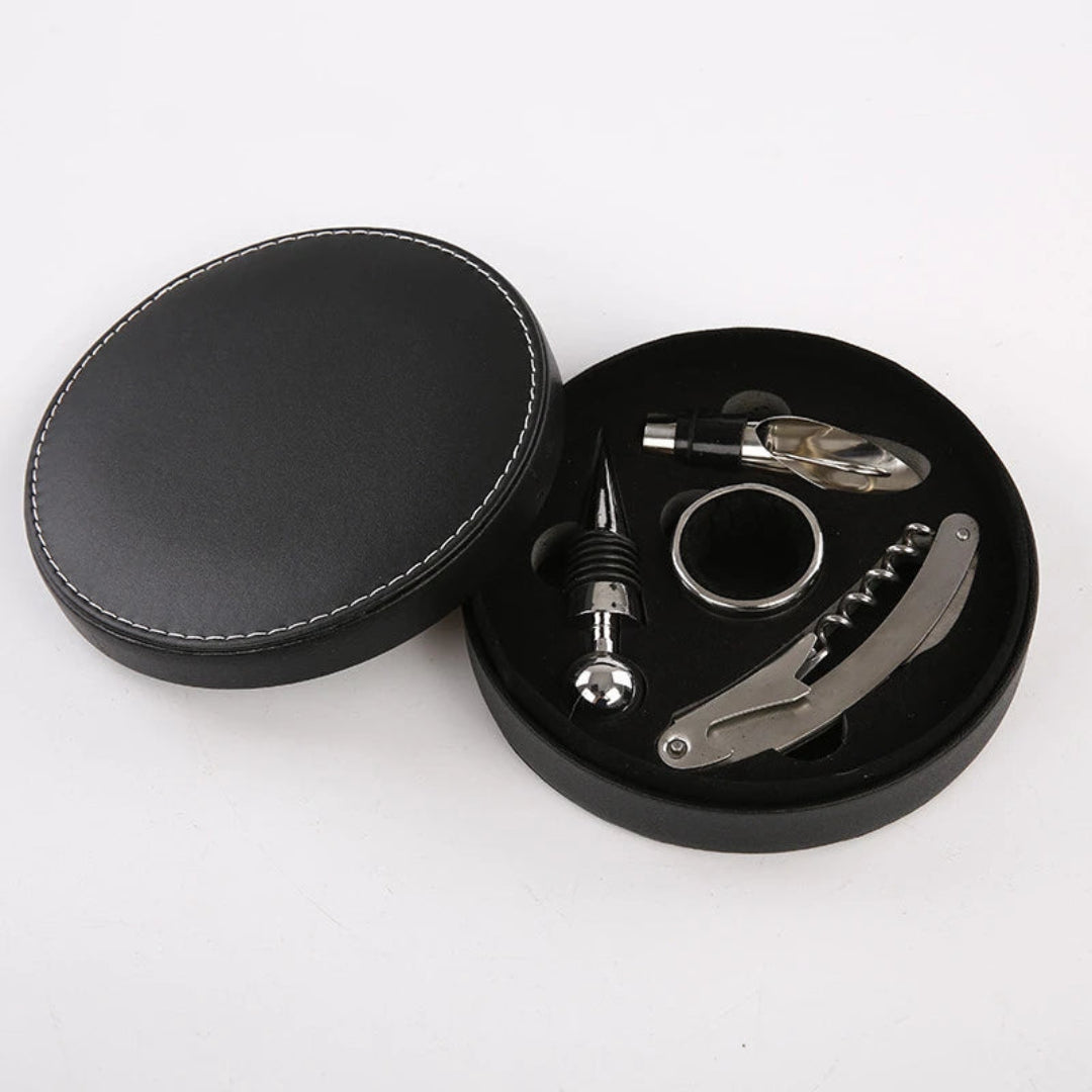 Wine tool set in a black round case on a white background